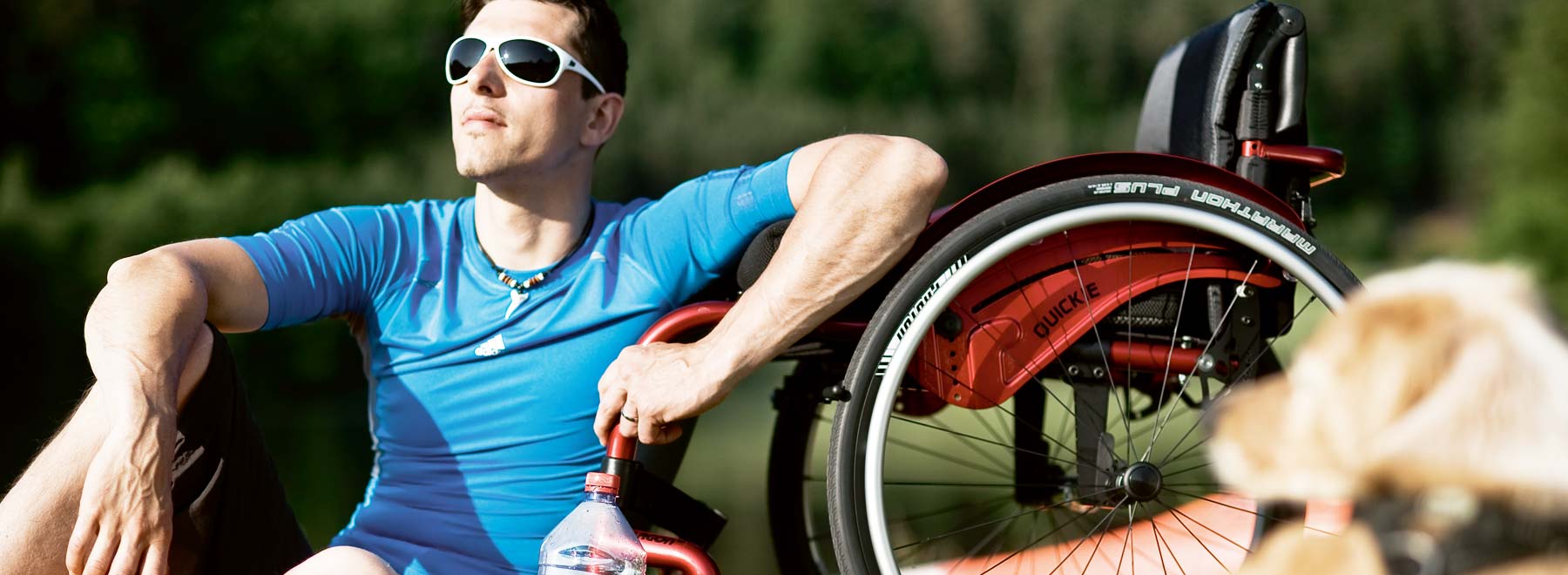 Man resting against wheelchair
